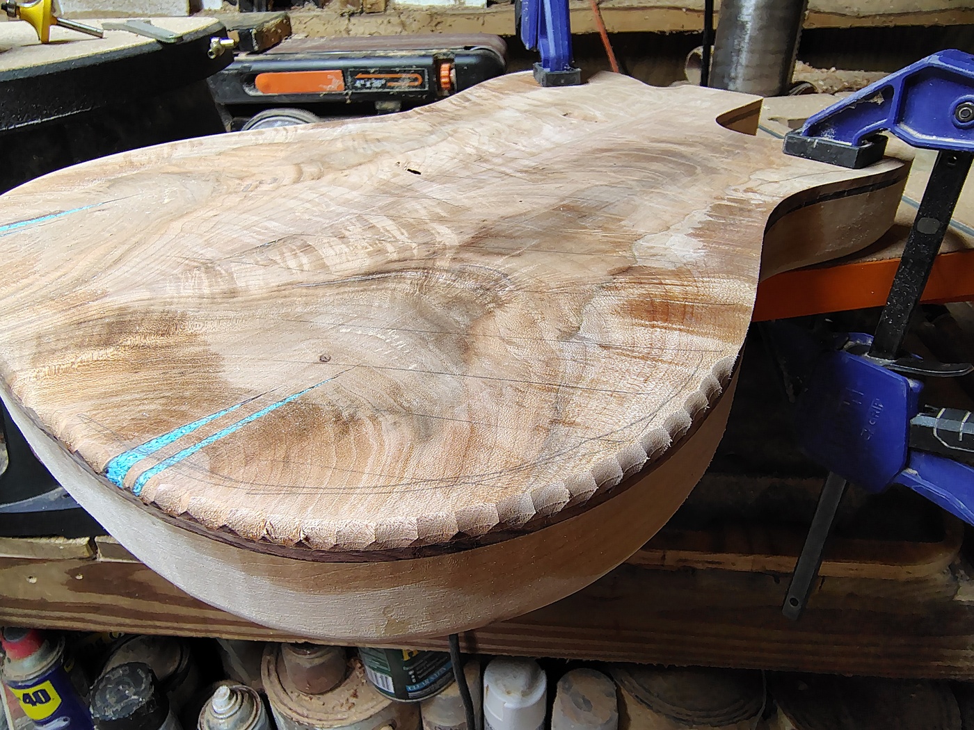 Bump cutting the top with a
roundover bit