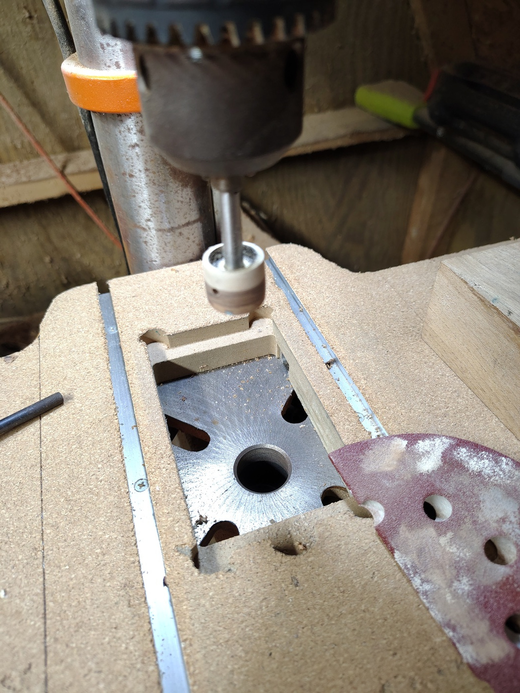 Knob in drill press for
sanding to shape