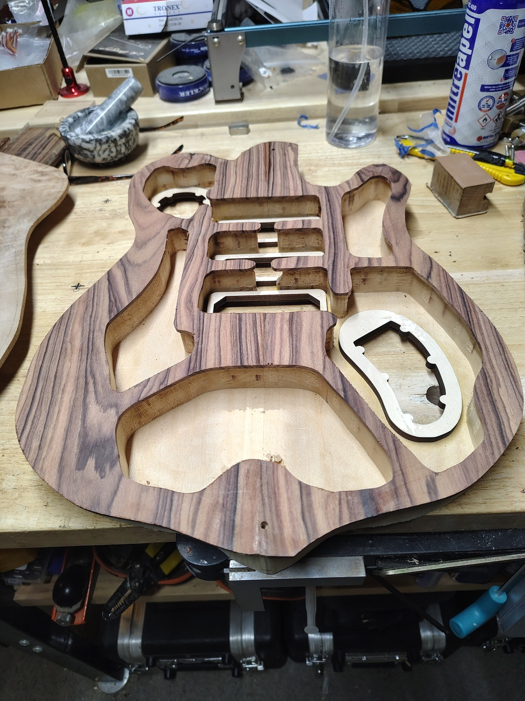 Middle layer glued on to body